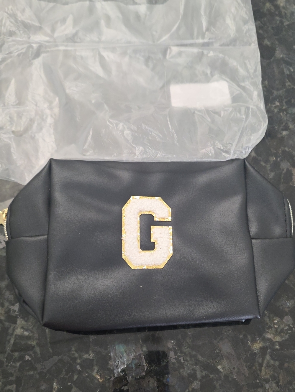 Black Men's Leather Travel Pouch with Gold 'G' Accent